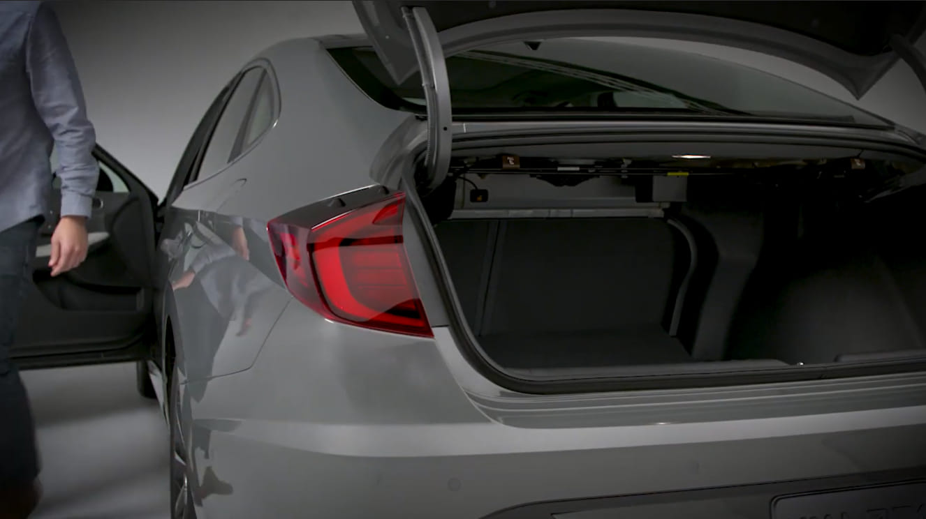 elantra trunk opens by itself