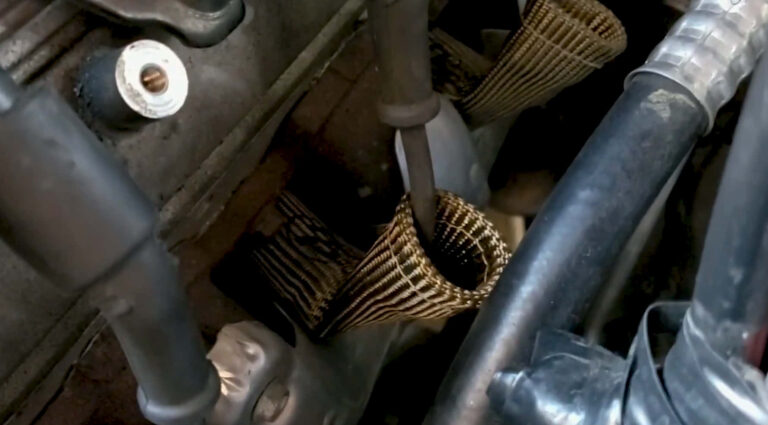 how to protect spark plug wires from headers