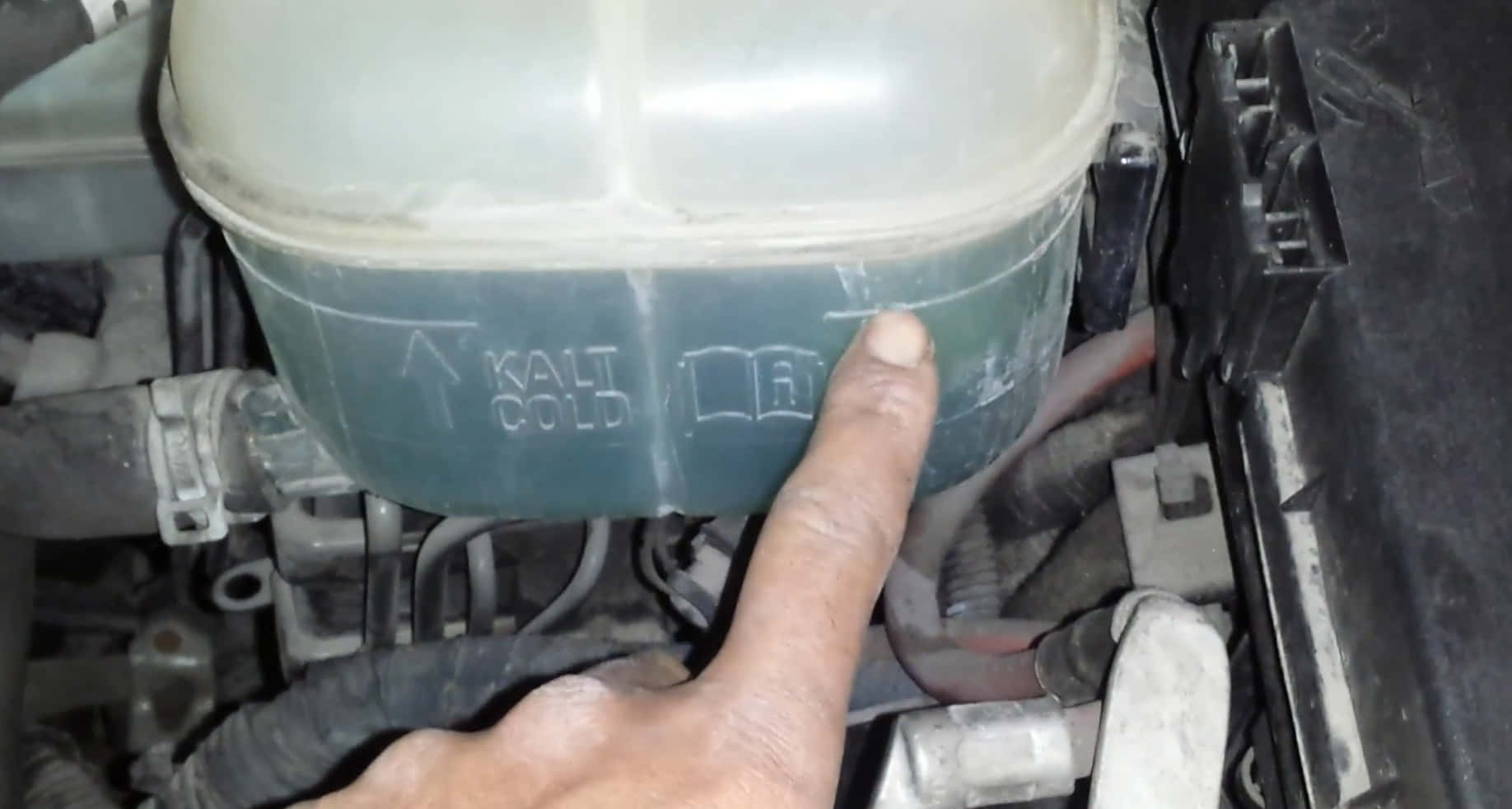 how to remove excess coolant from reservoir